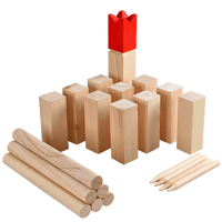 Wooden kubb game all the pieces arranged neatly