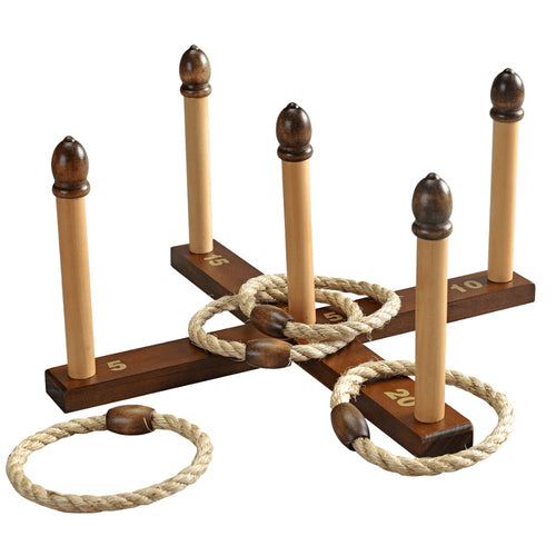 Wooden ring toss game with five vertical wooden poles on a wooden cross base, featuring cream-colored rope rings with dark brown wooden ends and numbered scoring zones on the base.