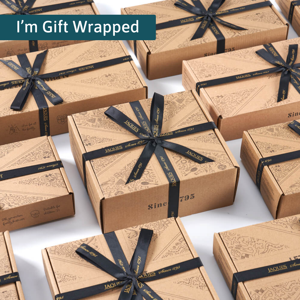 Stack of Jaques of London gift boxes tied with black ribbon and overlaid text reading ‘I’m Gift Wrapped’. 