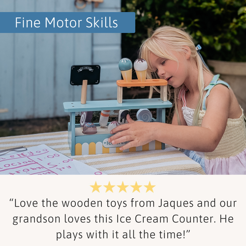 Child playing with a wooden ice cream counter toy, with text about fine motor skills and product satisfaction.  