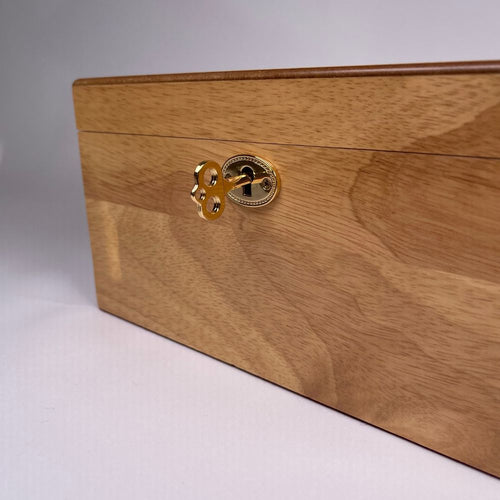 Wooden box with a gold lock 