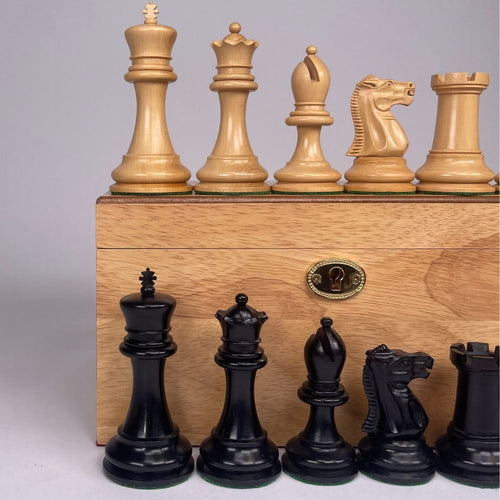 Close up of Staunton Chess Pieces with a Oak Box. 