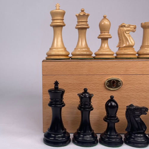 Close up of Traditional Staunton Chess Pieces and Beech Box 