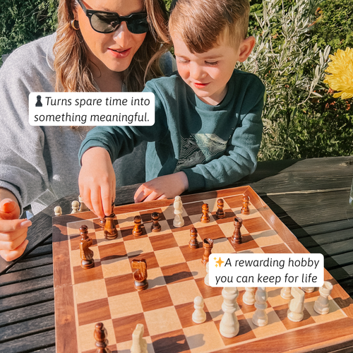 A woman sitting outdoors playing chess on a wooden folding chess set, with an informational text overlay about the product. 