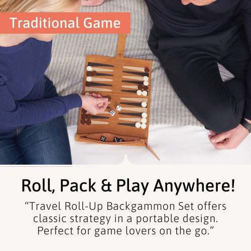 Two people playing a travel roll-up backgammon set on a couch. 
