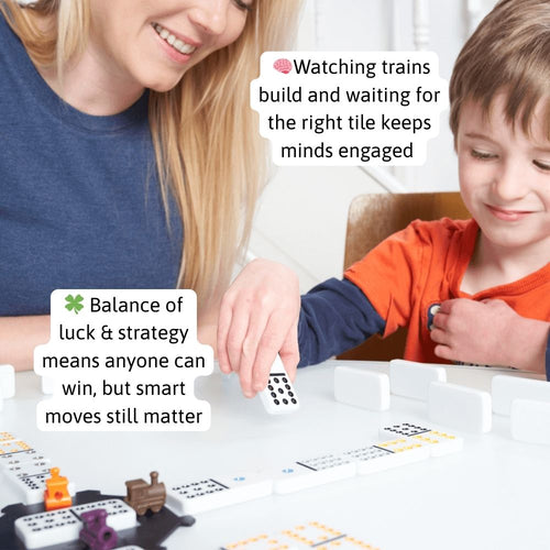 Child and adult playing Mexican Train dominoes at a table 