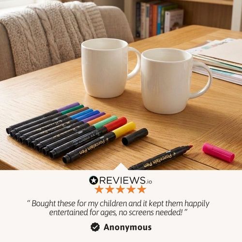 Jaques of London Paint Your Own Mug Set - two ceramic mugs and coloured markers arranged on a wooden table, 