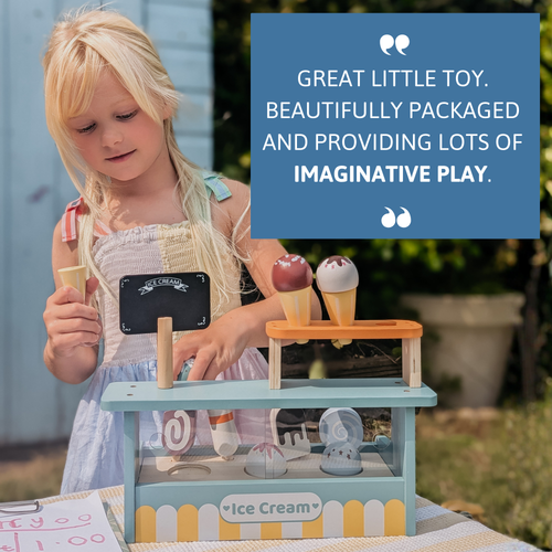 Child playing with an ice cream toy set outdoors, with a review quote on packaging.  