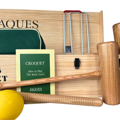 Croquet set with mallets, ball, and instructions in a Jaques wooden box.  