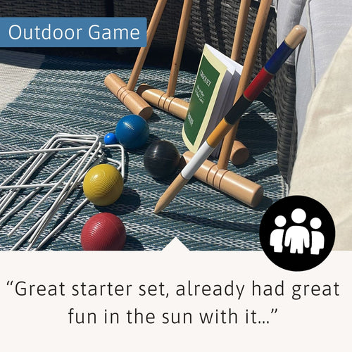 Outdoor setup of the Jaques of London Croquet Set on a patio with mallets, hoops, balls, and rule book, featuring text “Outdoor Game” and a five-star customer review about having fun in the sun. 