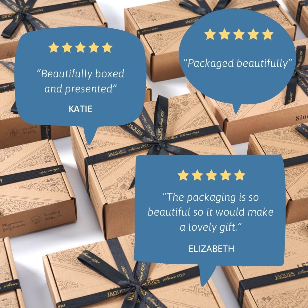 Collection of Jaques of London gift boxes tied with black ribbons, featuring customer reviews in blue speech bubbles praising the packaging and presentation. 