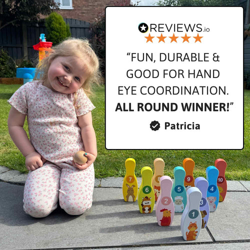 Child playing with colorful toy bowling pins in a garden, with a five-star review displayed. 