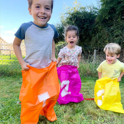  Kids playing with sports day activity set