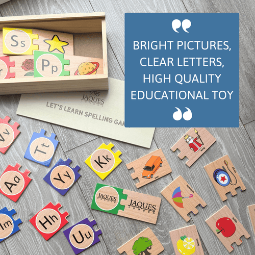 Educational toy with wooden letters and colourful illustrations on a wooden  surface.