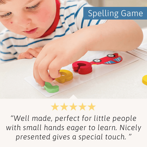 Child playing with a spelling game featuring colourful letters on a white surface.