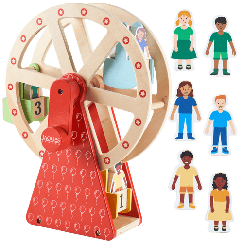 Wooden toy with a wheel and red base, featuring paper figures on a green background. [fill]