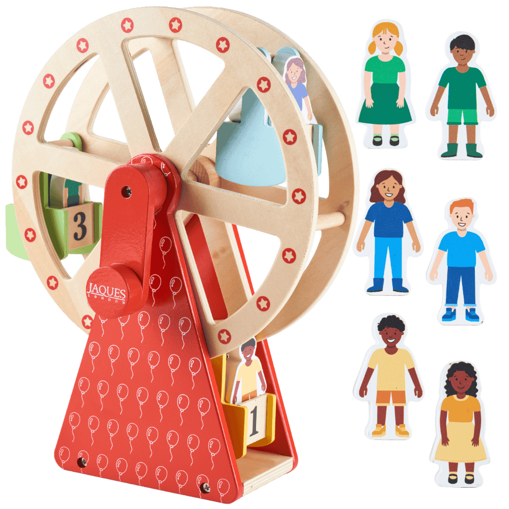 Wooden toy with a wheel and red base, featuring paper figures on a green background. 