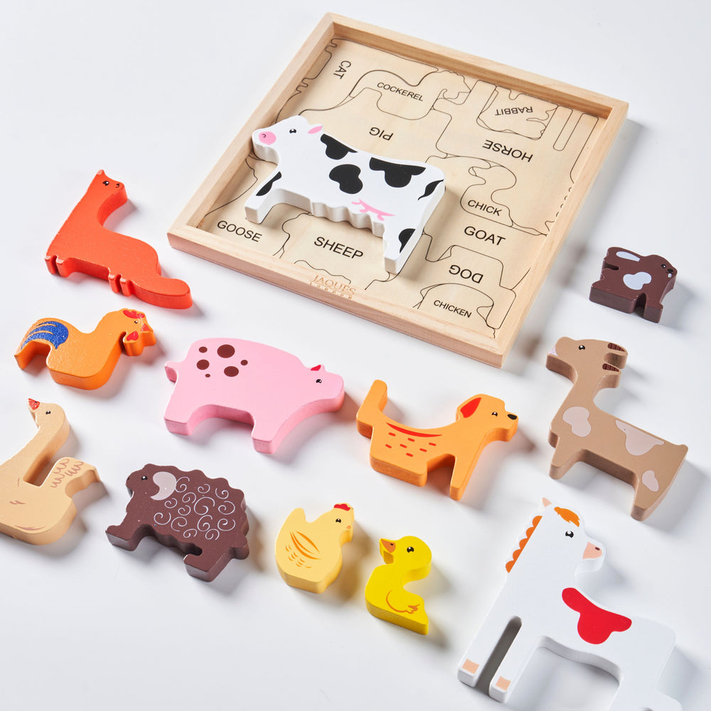 Wooden animal puzzle with colourful pieces on a white background 