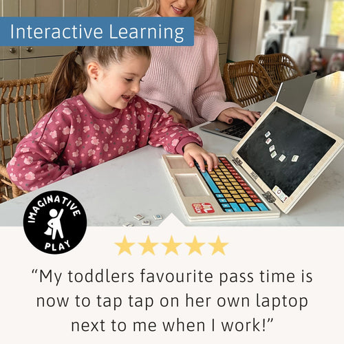 Child using wooden laptop toy beside parent, perfect for imaginative learning play 