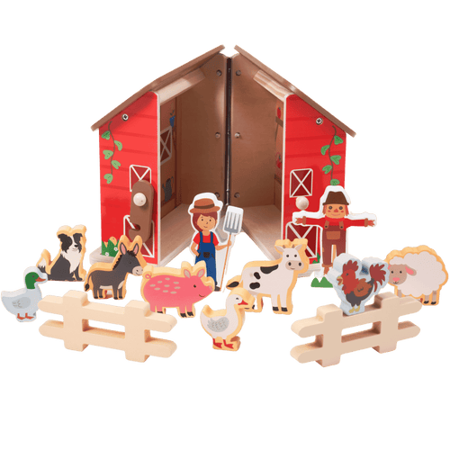 Toy barn set with farm animals and educational cards on a green background [fill]