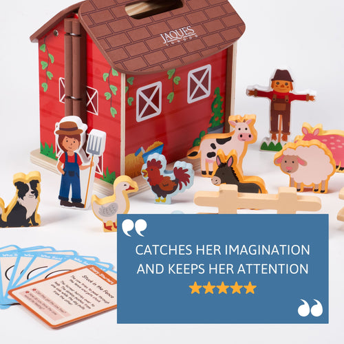 Wooden farm toy set with animals and a barn, featuring Jacques branding.
