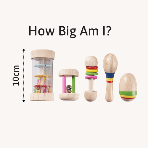 Set of wooden toys with size measurement on a white background 