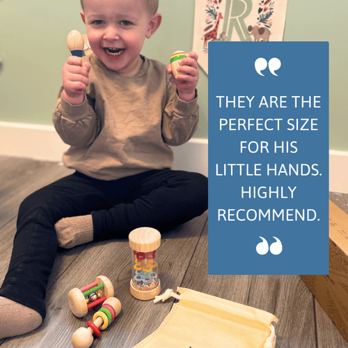 Child playing with wooden toys on a wooden floor, with a blue text box featuring customer feedback.