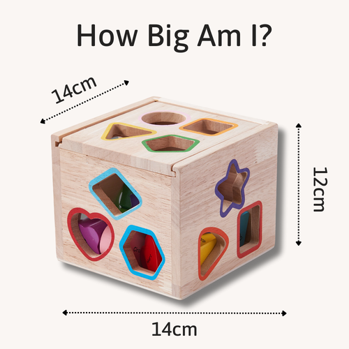 Wooden shape sorting cube with measurements on a white background 