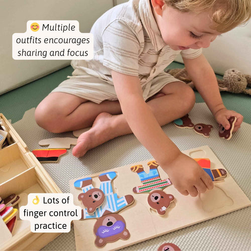 Child playing with a wooden puzzle on the floor 