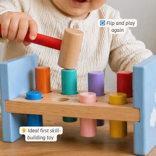 Child playing with a wooden toy hammer and colourful cylindrical blocks.