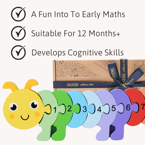 Educational toy with colourful segments and a box labelled 'Jacques' on a white background. 