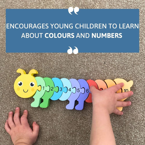 Colourful caterpillar toy with numbers on a carpeted floor, encouraging children to learn colours and numbers. 