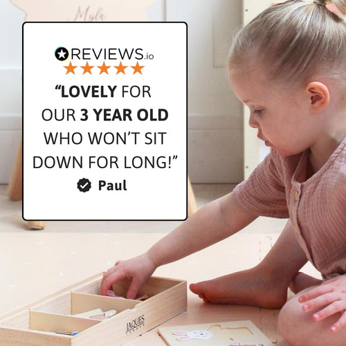 Child playing with a wooden toy set on the floor, with a 5-star review quote displayed.