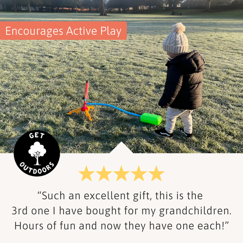 A young child in a winter coat stands beside the Rapid Rocket launcher in a frosty field, ready to stomp and launch the foam rocket, with a five-star customer review below. 