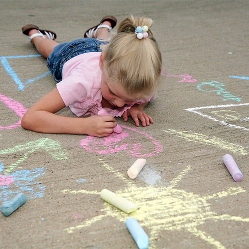  Girl drawing with colourful giant chalks
