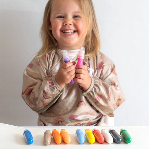 Child with paint pens 