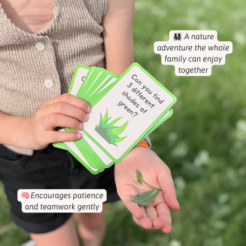 Jaques of London Nature Scavenger Hunt Game - child holding a leaf while reading a scavenger hunt clue card about finding different shades of green, 