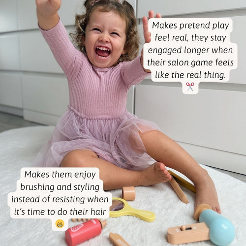 A child excitedly playing hairdresser with their pretend salon tools 