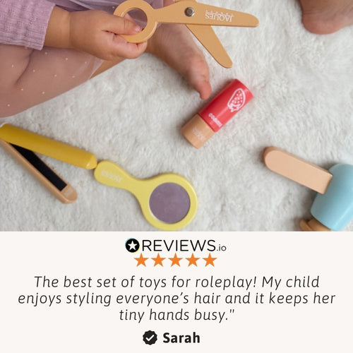 Hands-on styling play with pretend scissors and hair tools 