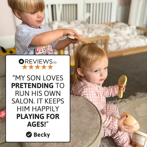 Kids enjoying imaginative hair salon role play together 