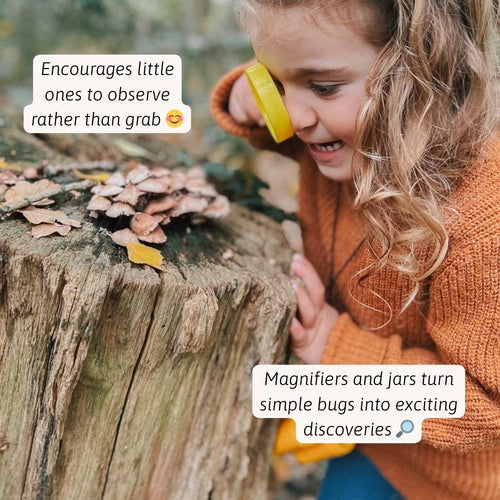 A child carefully observing insects in nature during a bug hunting adventure 