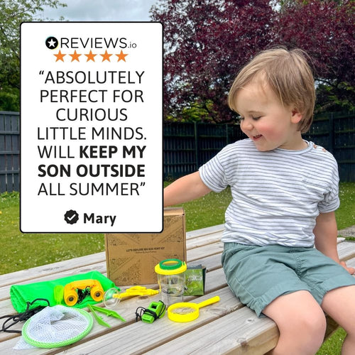 A child enjoying outdoor discovery with their bug hunting kit 