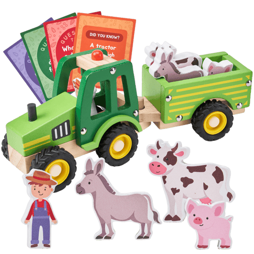 Toy tractor with trailer, farm animals, and educational cards on a green background [fill]