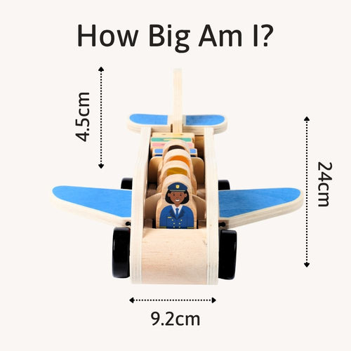 Wooden toy airplane with measurements on a white background