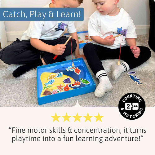 Two children playing with a fishing game, sitting on the floor with colourful fish illustrations. 