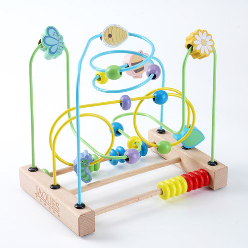 Colourful wooden bead maze toy with flowers and animals on a white background 
