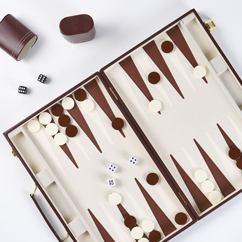 Backgammon set with pieces and dice on a white background 