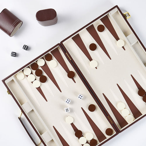Backgammon set with pieces and dice on a white background 