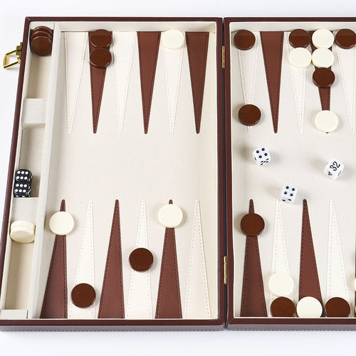 Backgammon set with pieces and dice in a brown and white case on a white background 