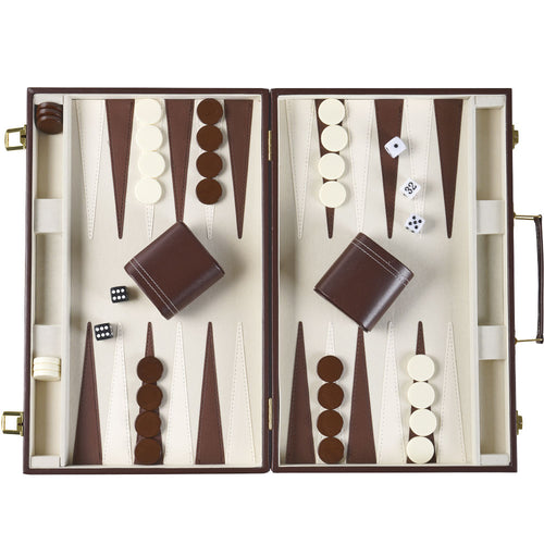 Backgammon set with pieces and dice in a wooden case on a white  background 